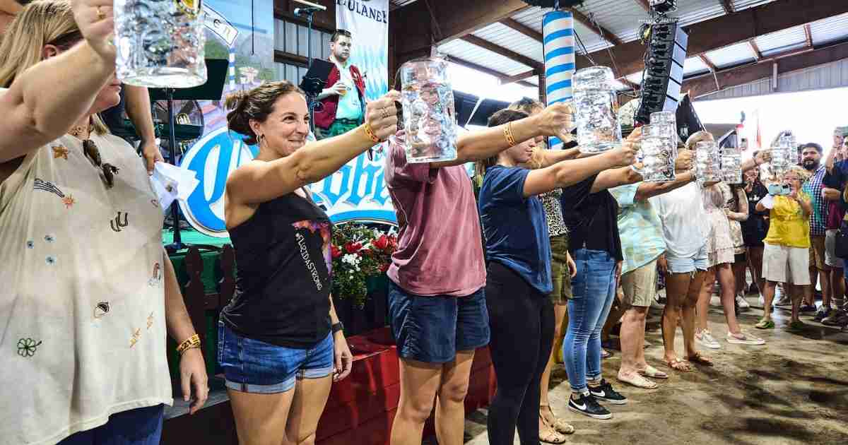 Women holding glasses at Oktoberfest Florida